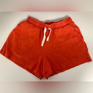 5/25 orange color Primark cotton shorts size 8-9 years old
